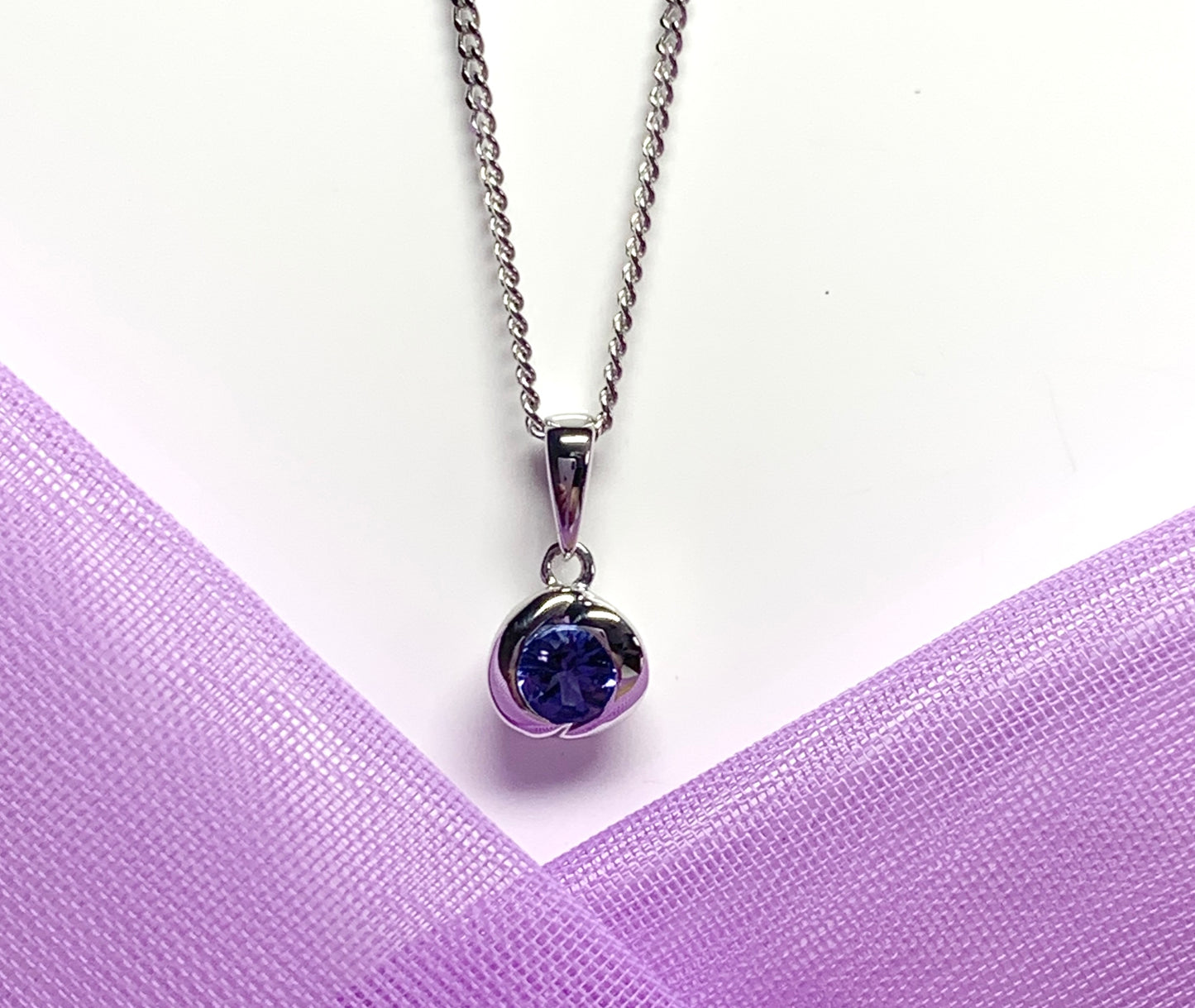 Real tanzanite necklace round white gold pendant