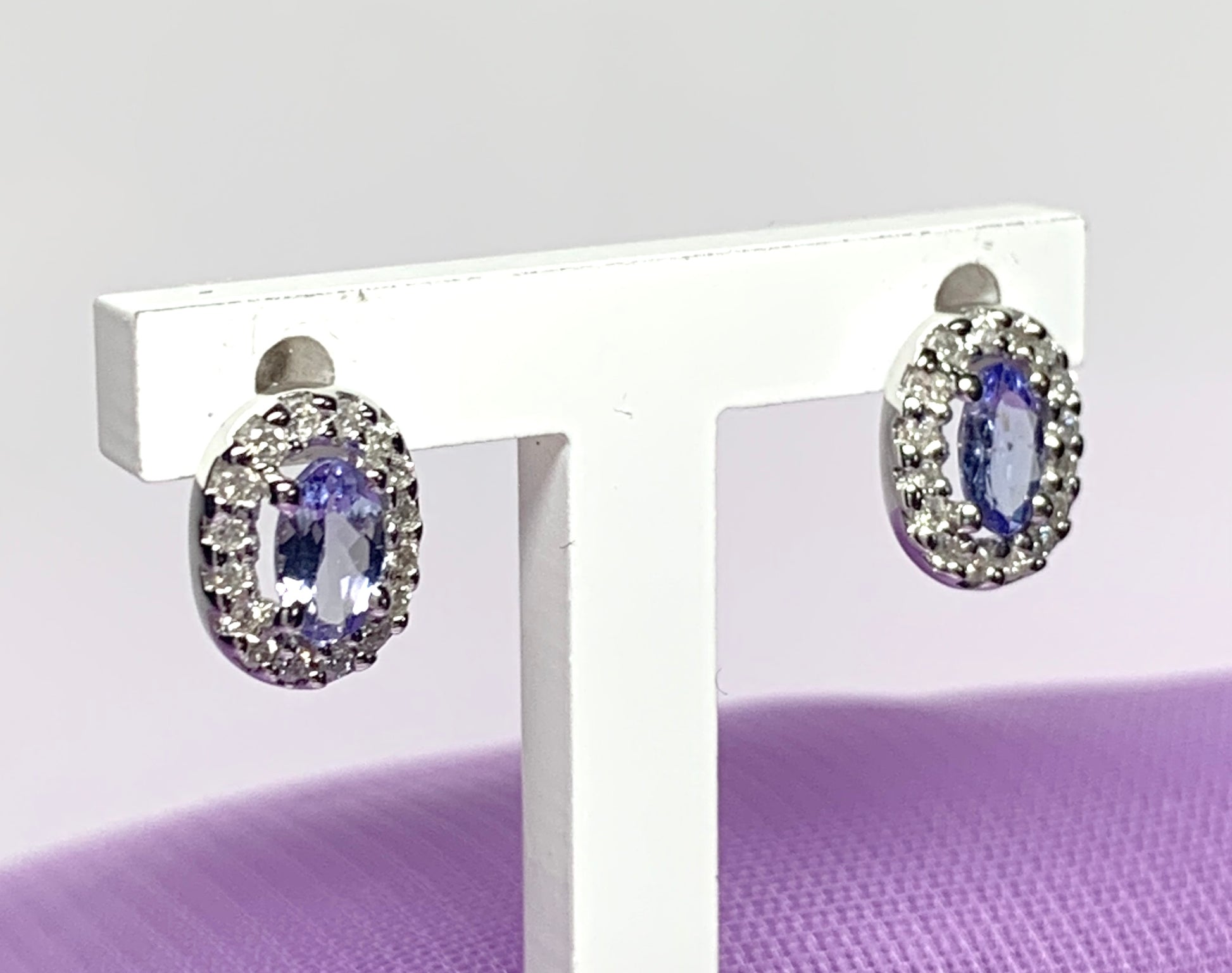 Real tanzanite stud earrings with diamonds white gold oval cluster