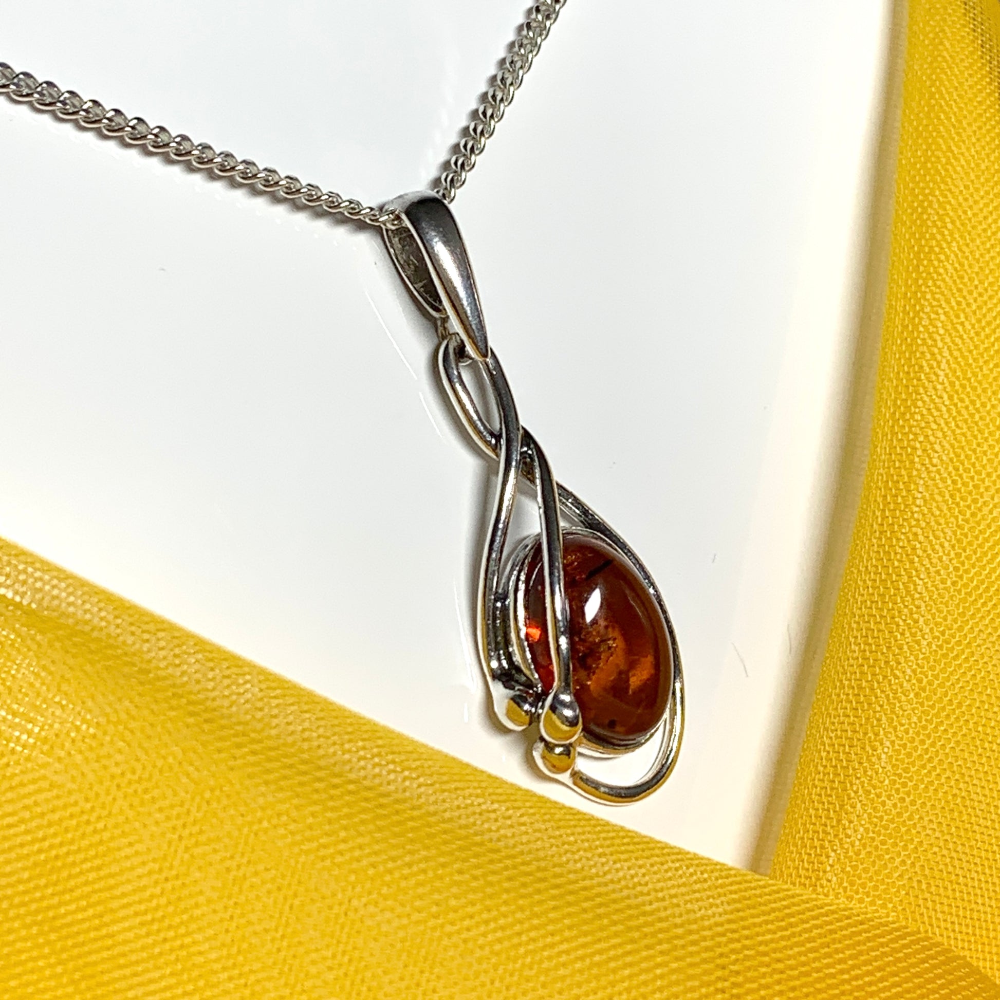 Real teardrop pear shaped fancy amber necklace sterling silver