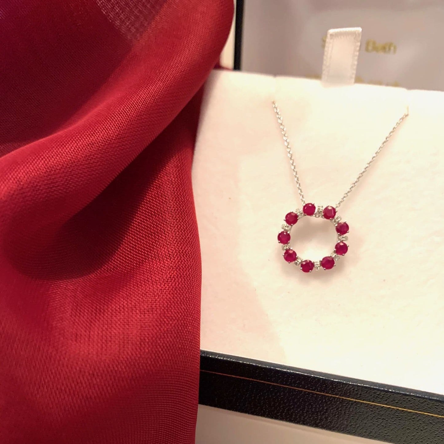 Real deep red round ruby and diamond white gold circle cluster necklace