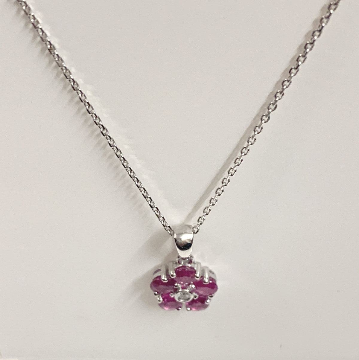 Real red ruby and diamond white gold daisy cluster necklace