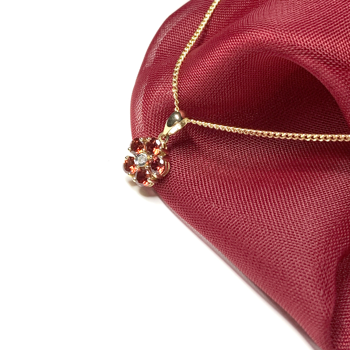 Red brown garnet and diamond yellow gold daisy cluster necklace pendant