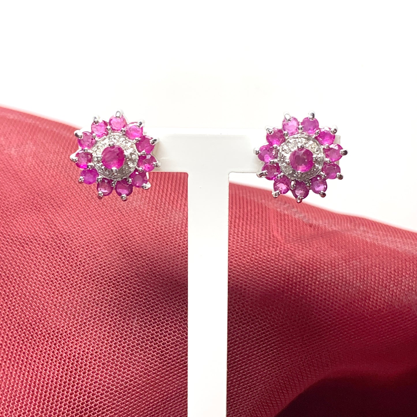 Red round ruby and diamond sterling silver cluster stud earrings