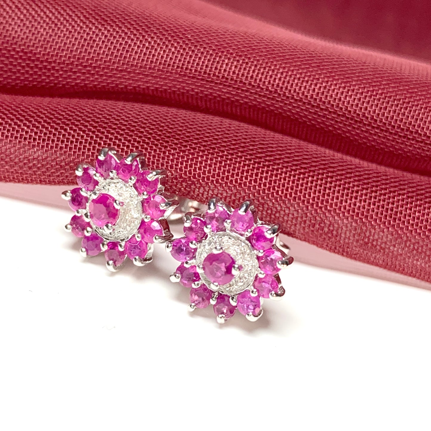 Red round ruby and diamond sterling silver cluster stud earrings