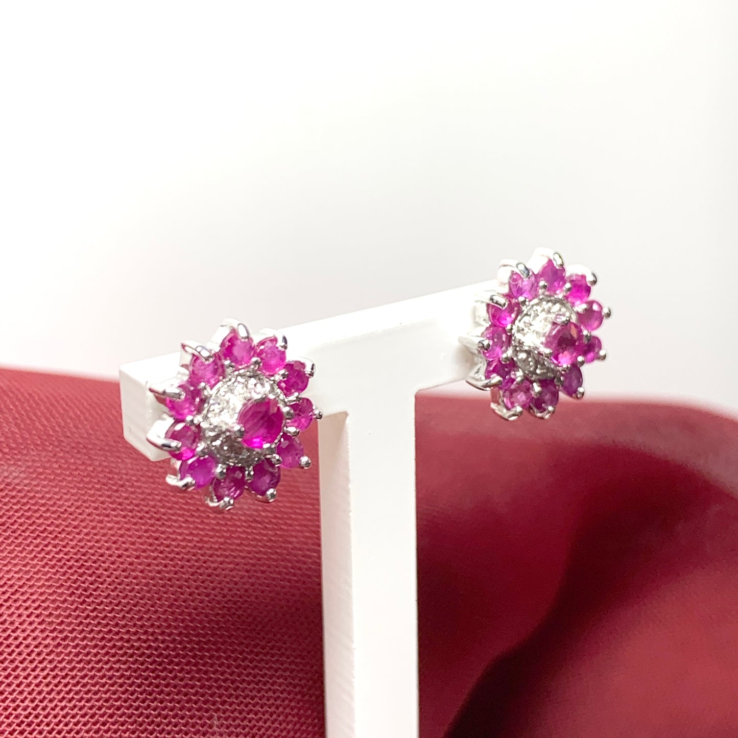 Red round ruby and diamond sterling silver cluster stud earrings