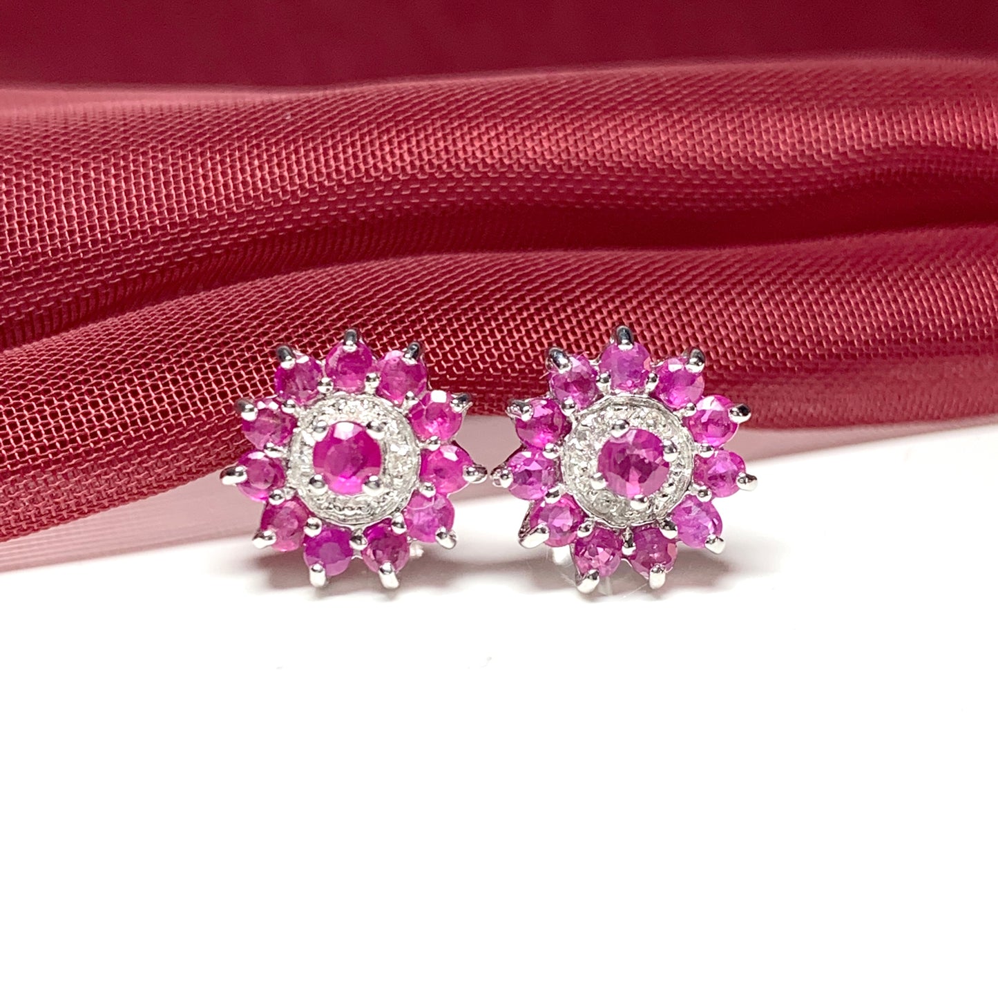 Red round ruby and diamond sterling silver cluster stud earrings