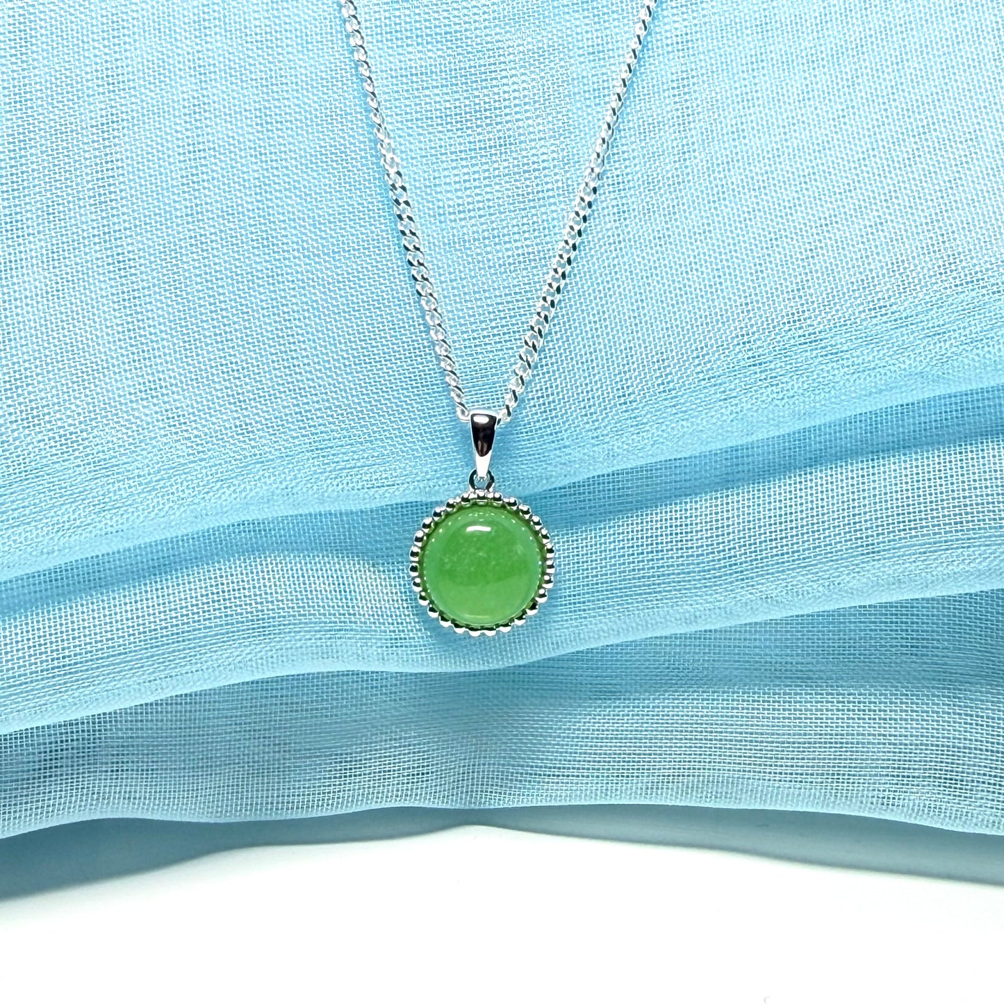 Round green jade patterned bobbled necklace sterling silver pendant with chain included