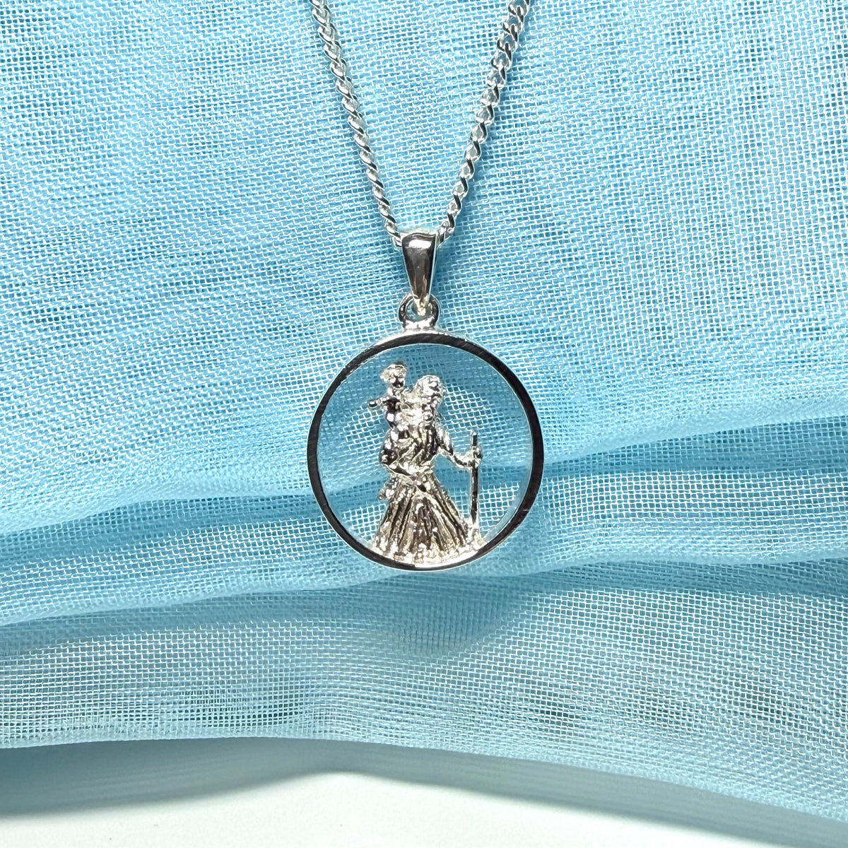 Round sterling silver St. Christopher including chain