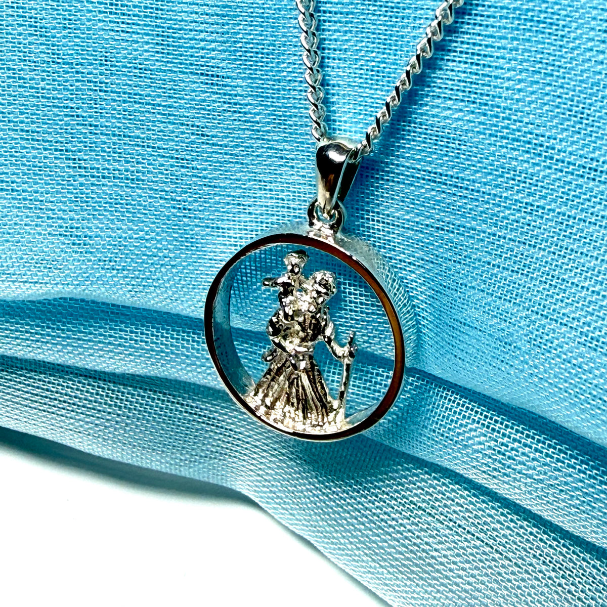 Round sterling silver St. Christopher including chain