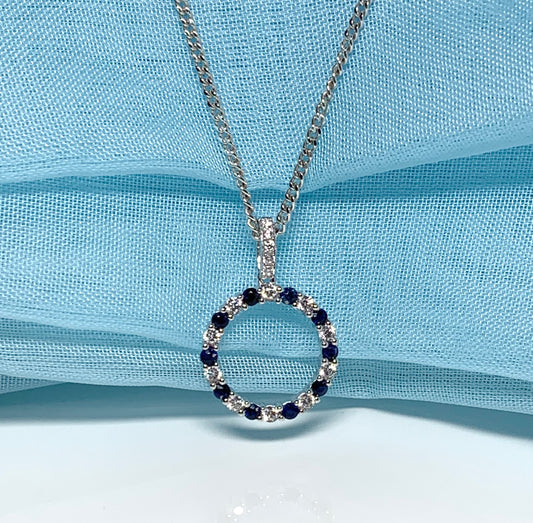 Round blue sapphire and cubic zirconia sterling silver necklace pendent