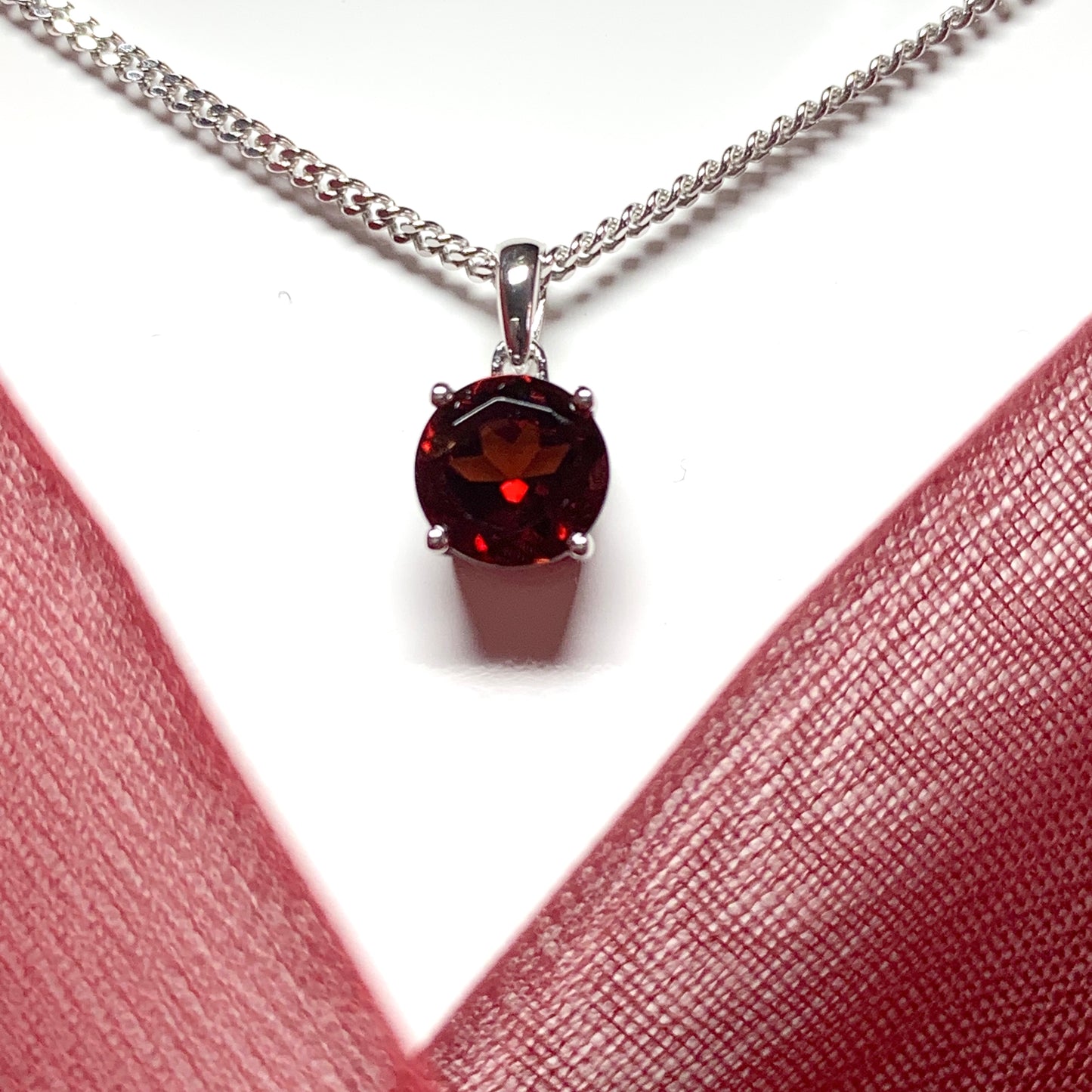 Classic round garnet sterling silver necklace