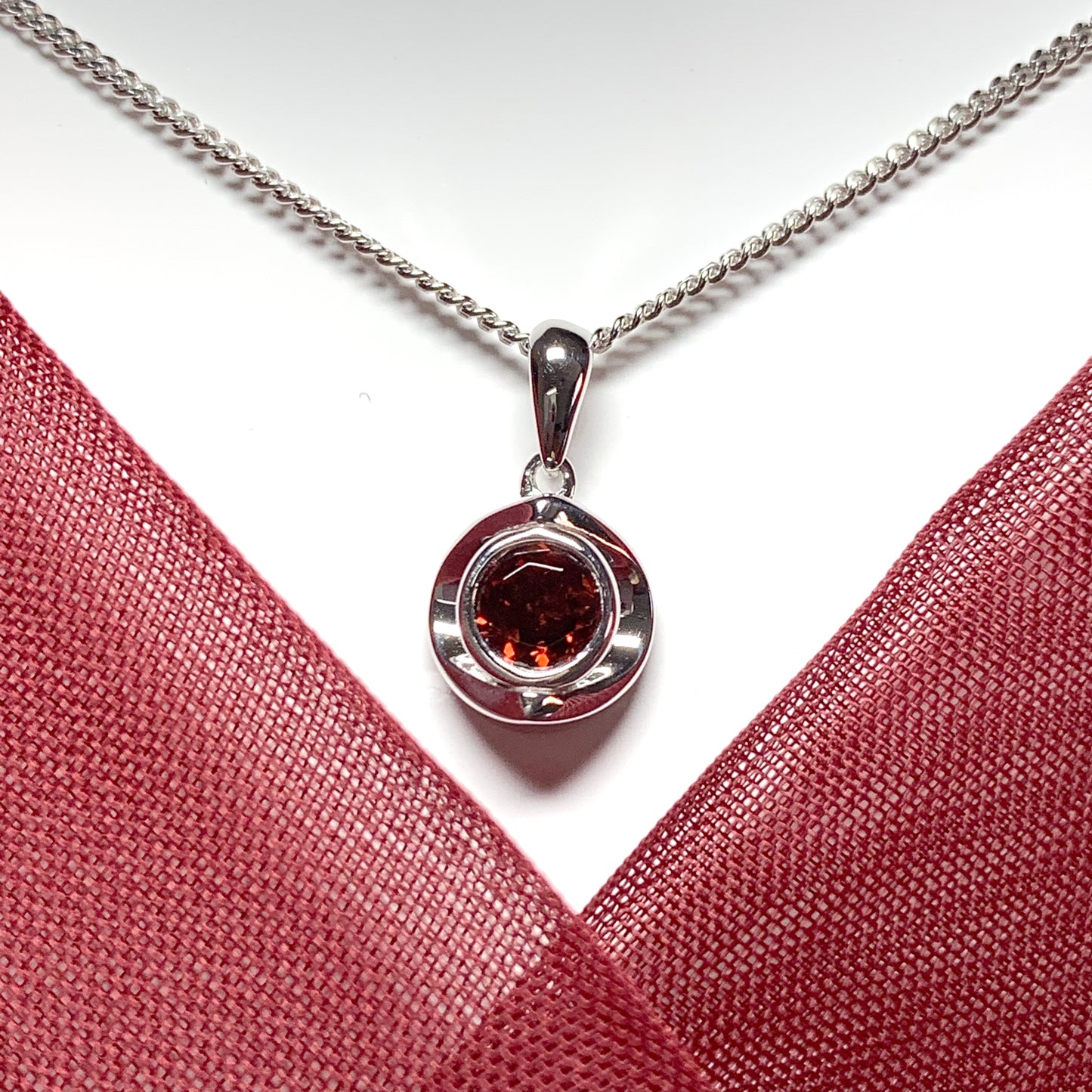 Round garnet sterling silver necklace