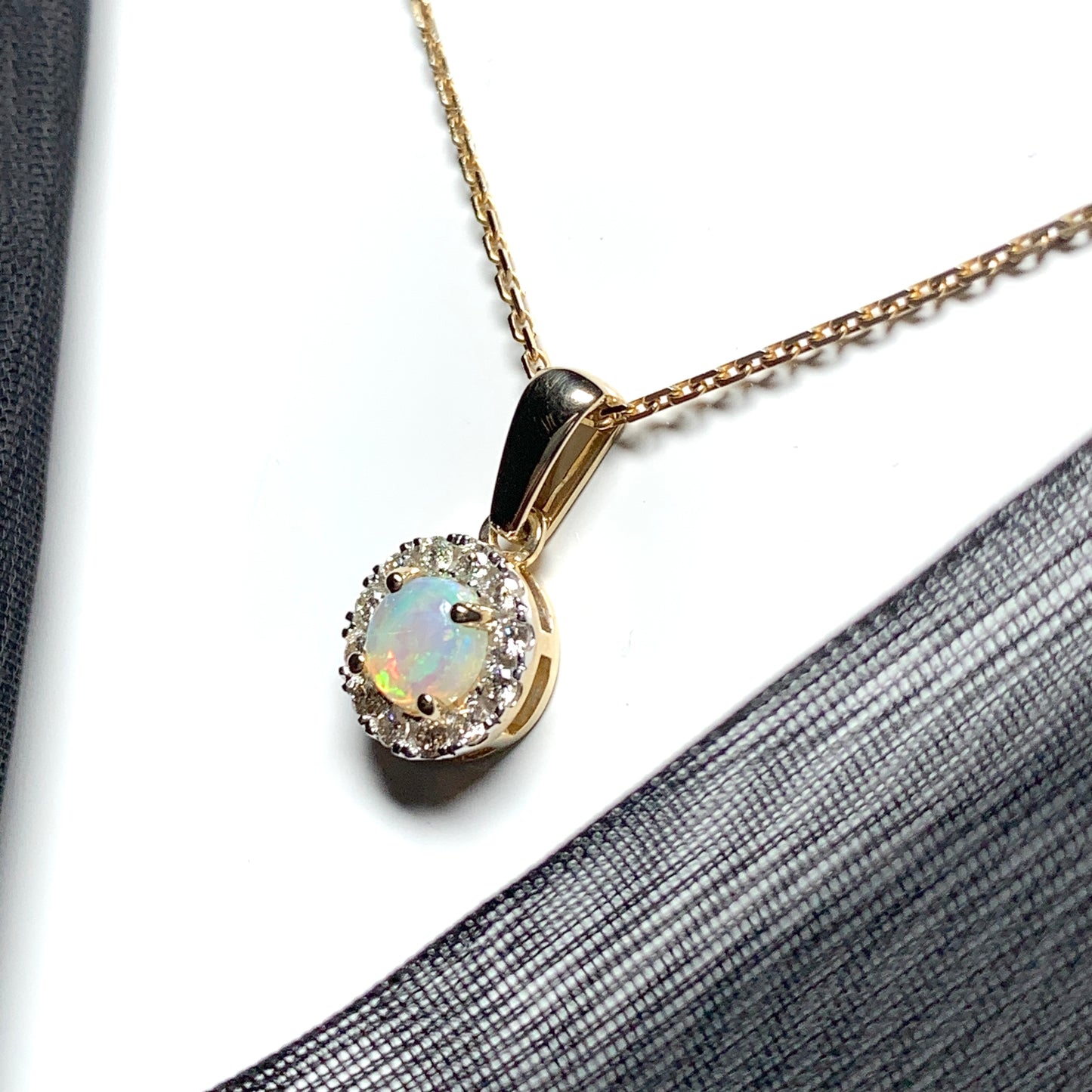 Round opal and diamond yellow gold cluster necklace