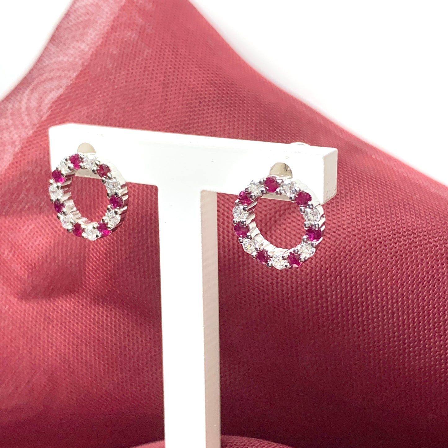 Round red ruby and cubic zirconia sterling silver stud earrings