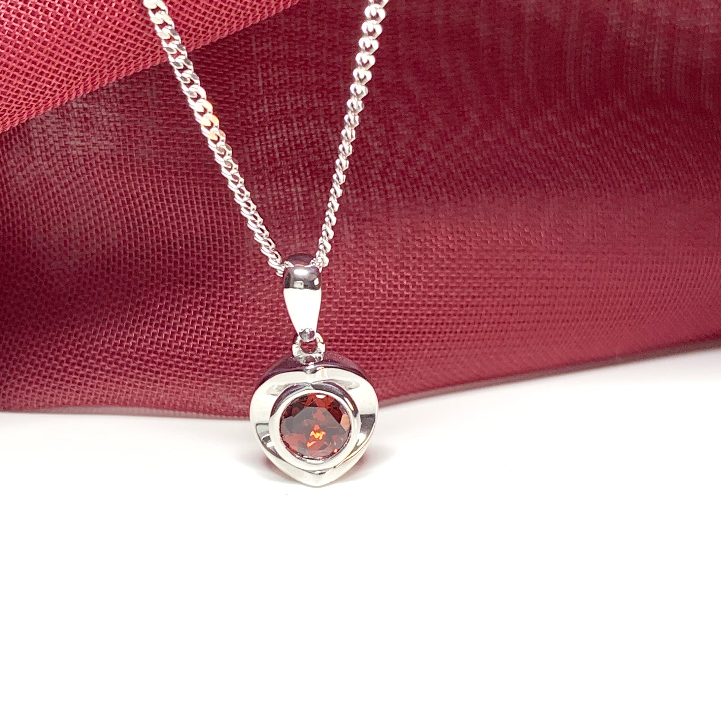 Round garnet sterling silver necklace