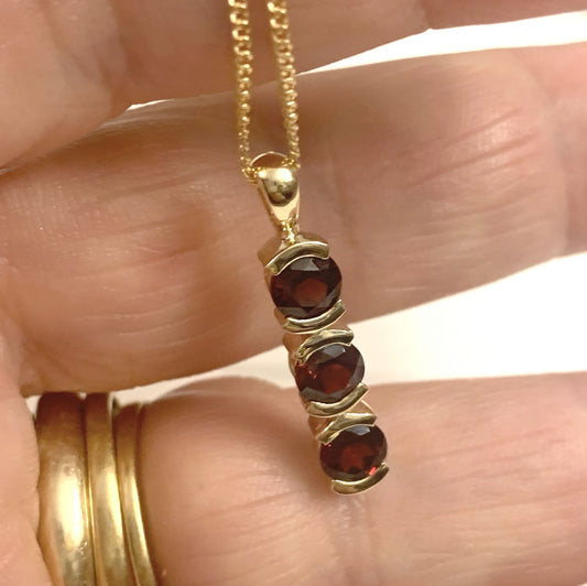 Round triple trilogy red garnet necklace pendant yellow gold