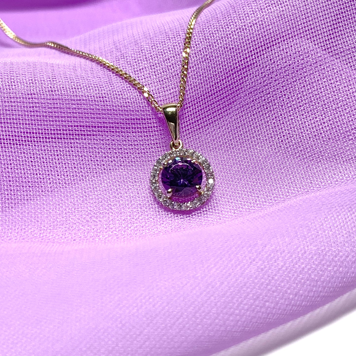 Round yellow gold and amethyst and cubic zirconia necklace pendent