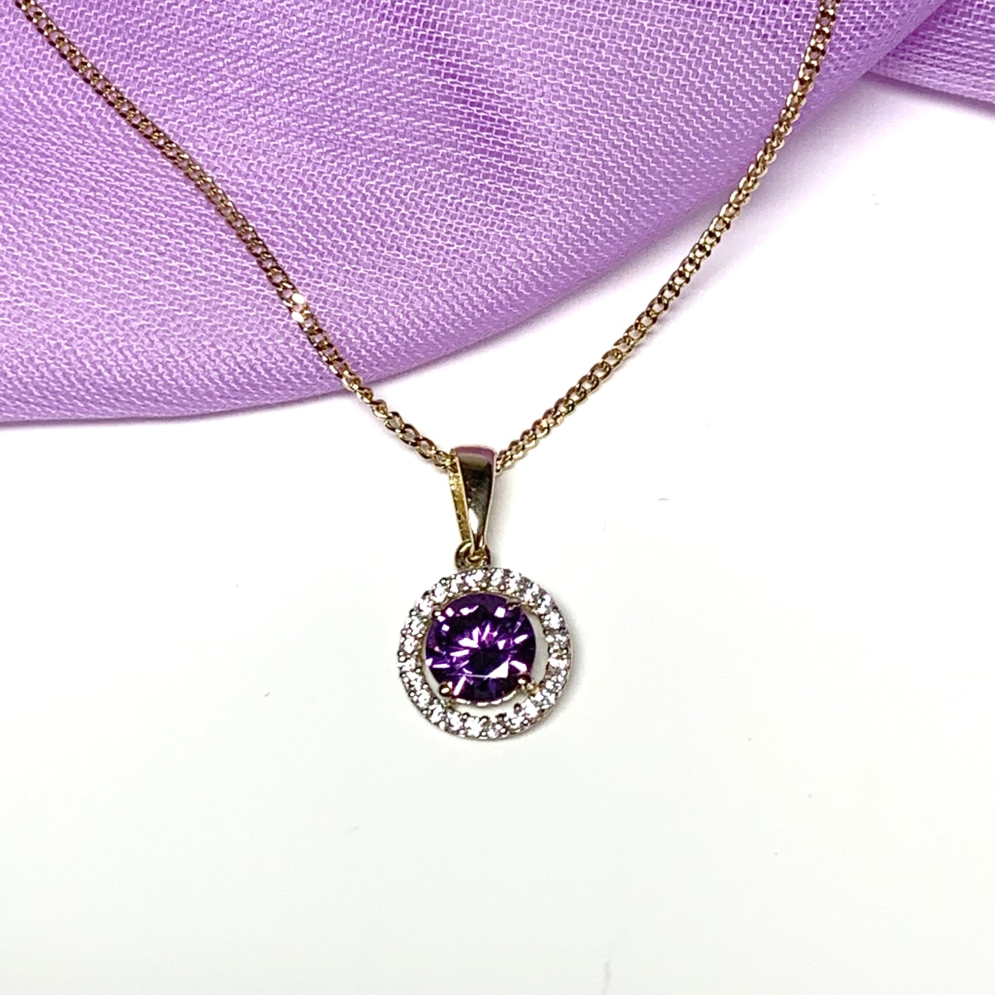 Round yellow gold and amethyst and cubic zirconia necklace pendent