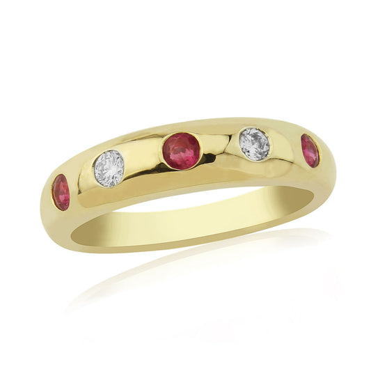 Real red ruby diamond eternity or wedding ring, with a smooth rubbed over setting, so that there are no claws that can catch onto clothing.