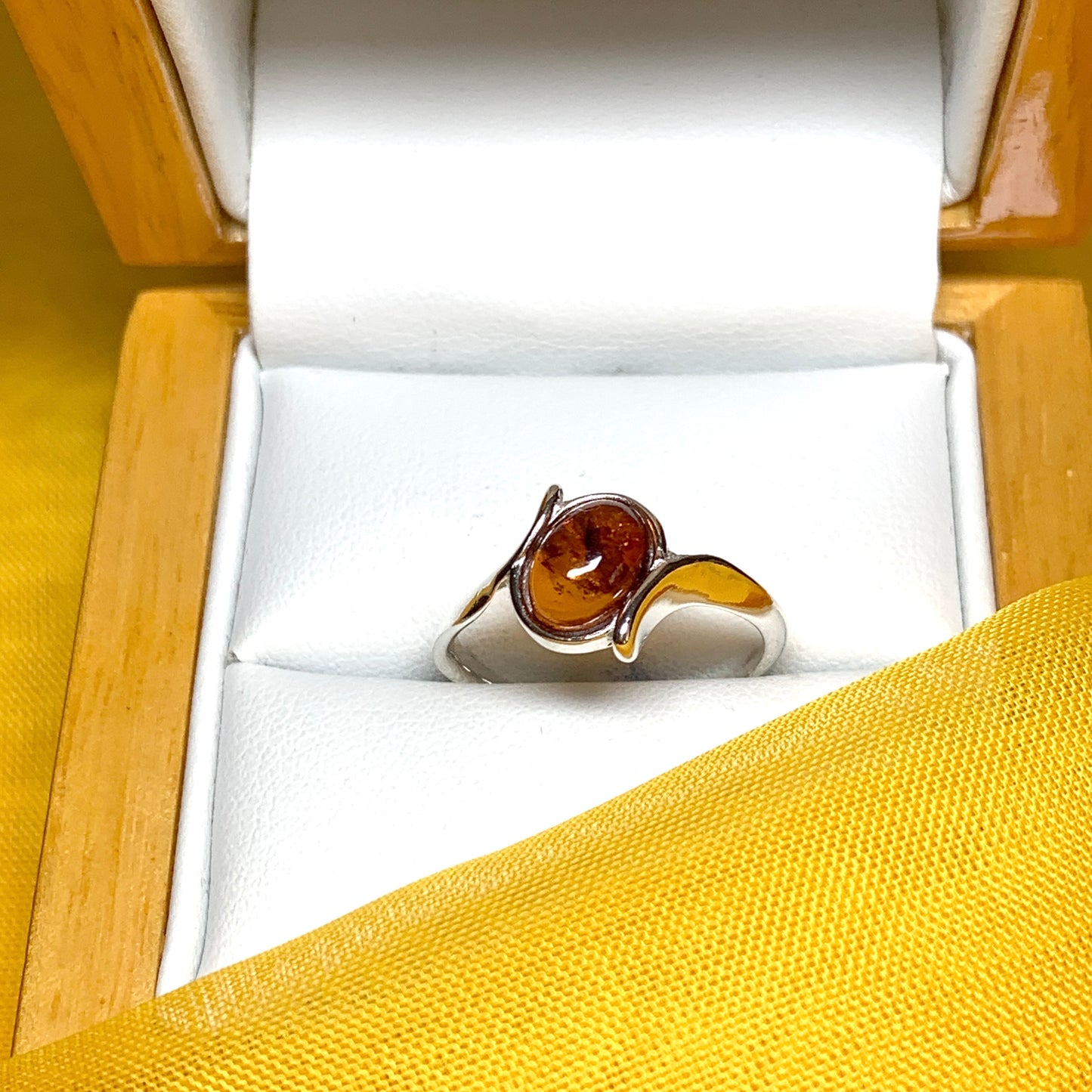 Twisted Sterling Silver Oval Orange Amber Ring