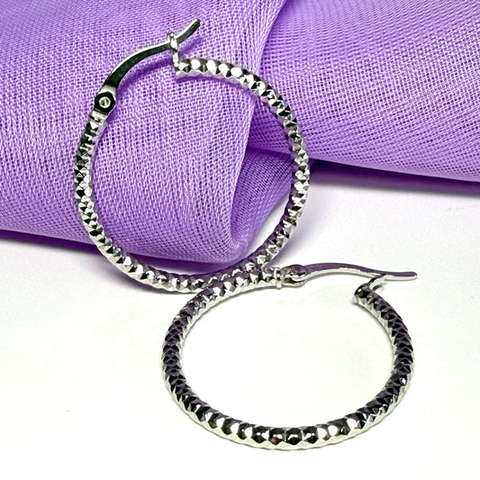 Silver hoop earrings diamond cut patterned