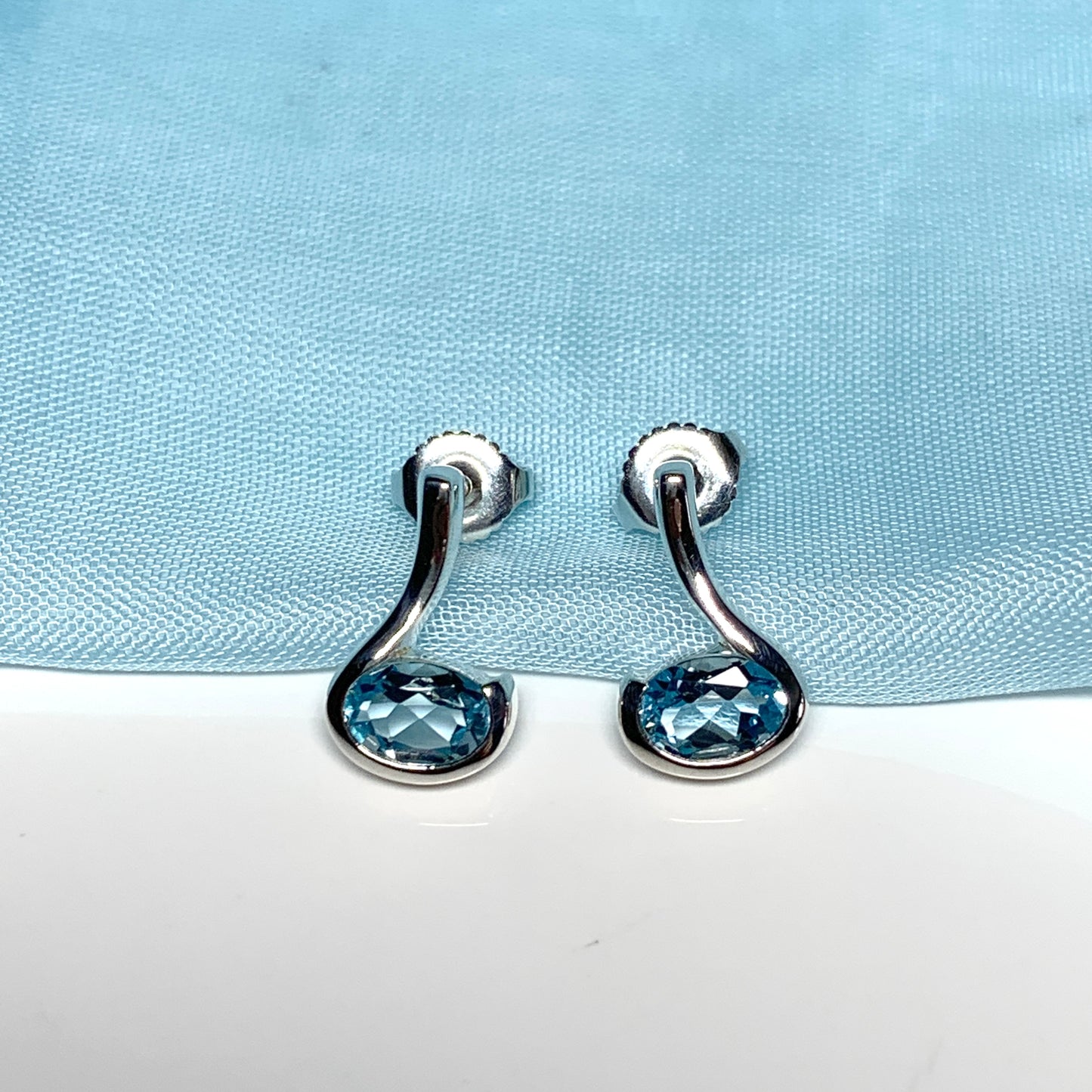 Real blue topaz earrings fancy stud swirl