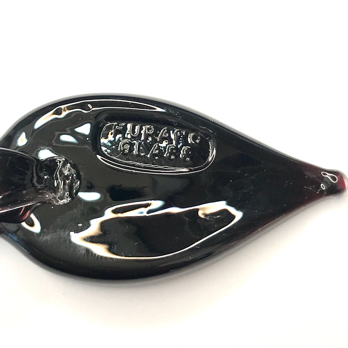 Small Black And Gold Coloured Real Murano Glass Leaf Shaped Pendant With the Genuine Murano Glass stamp on the back of it