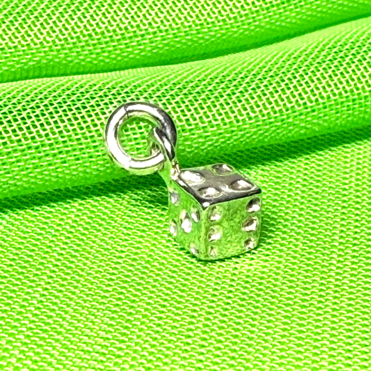 Small dice shaped sterling silver charm