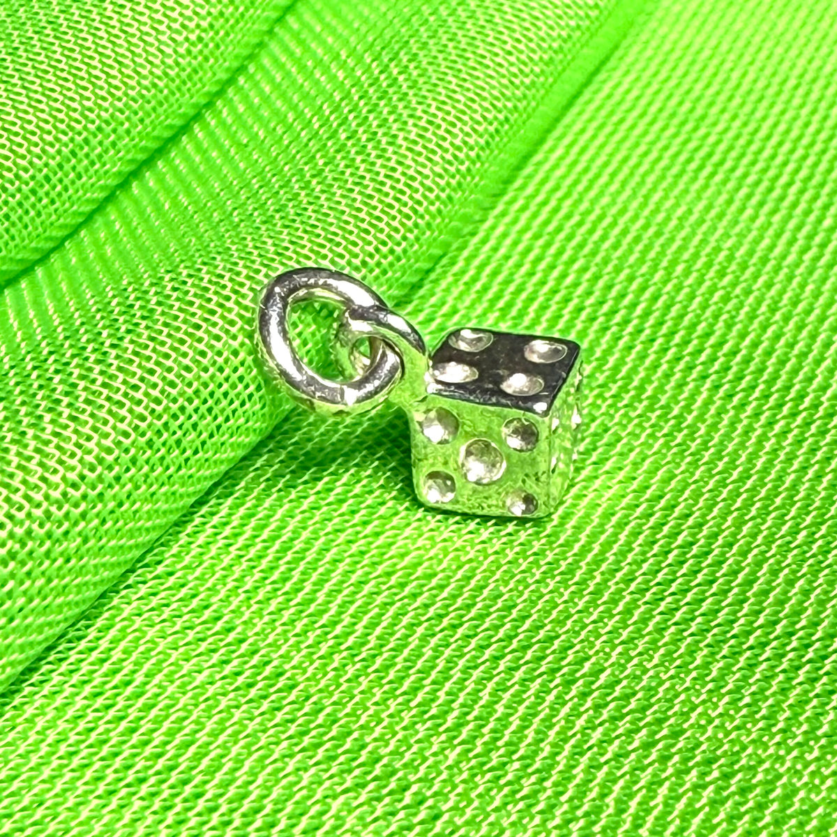 Small dice shaped sterling silver charm