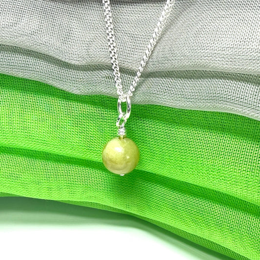 A small real green gypsum necklace ball shaped, a gorgeous pendant