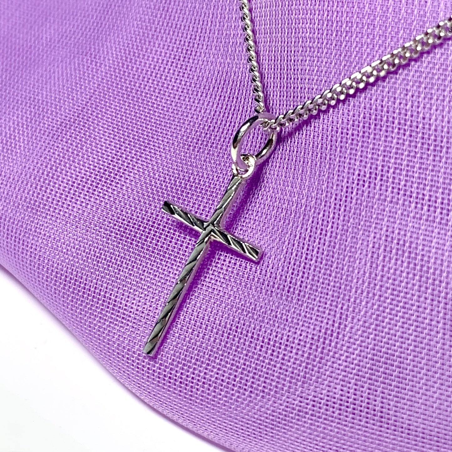 Small solid diamond cut reversible cross patterned sterling silver and chain