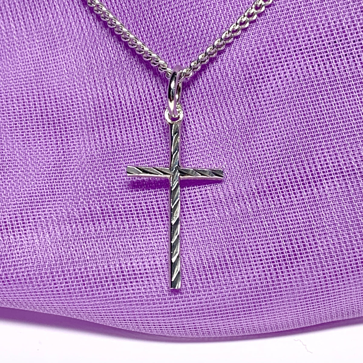 Small solid diamond cut reversible cross patterned sterling silver and chain