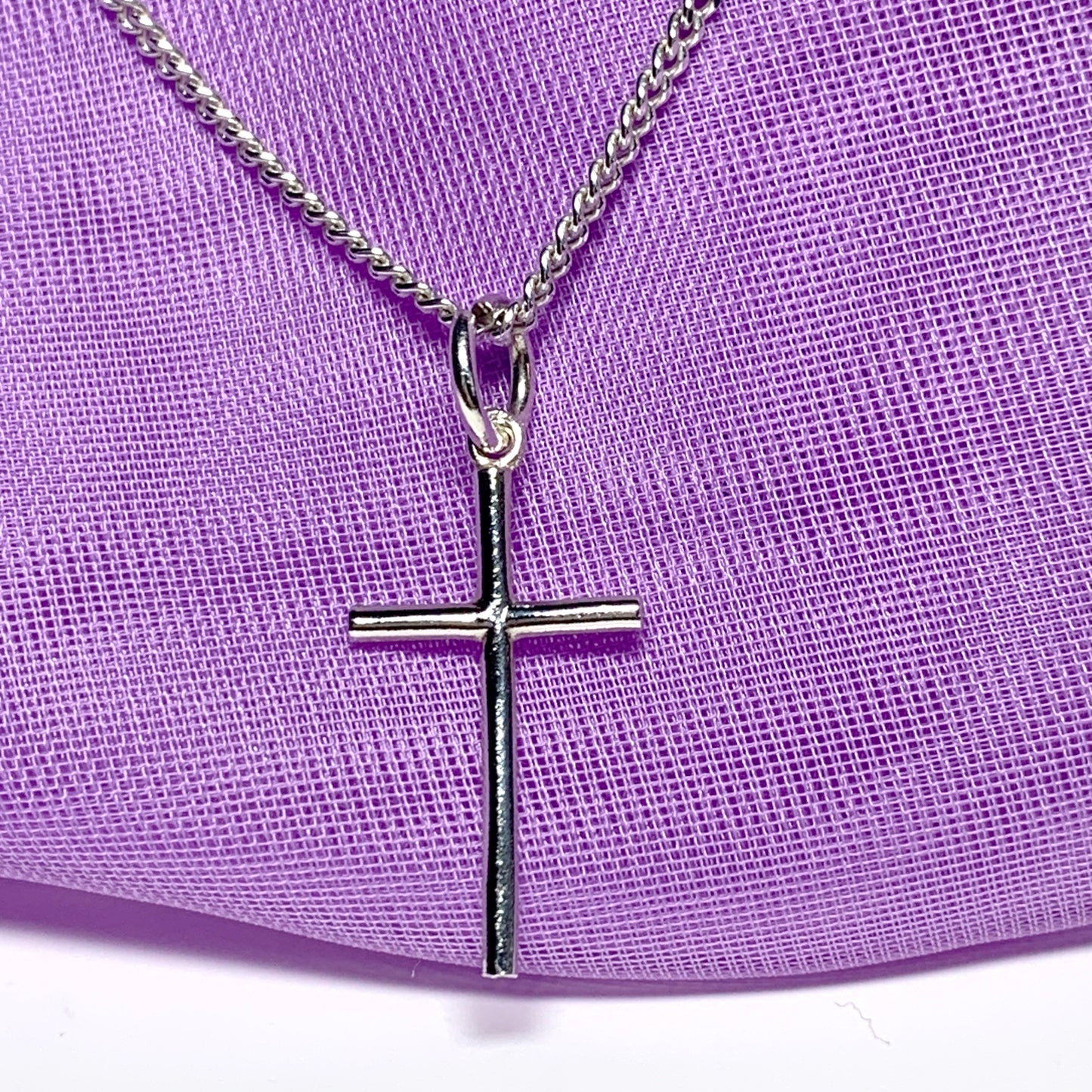 Small solid diamond cut reversible cross patterned sterling silver and chain