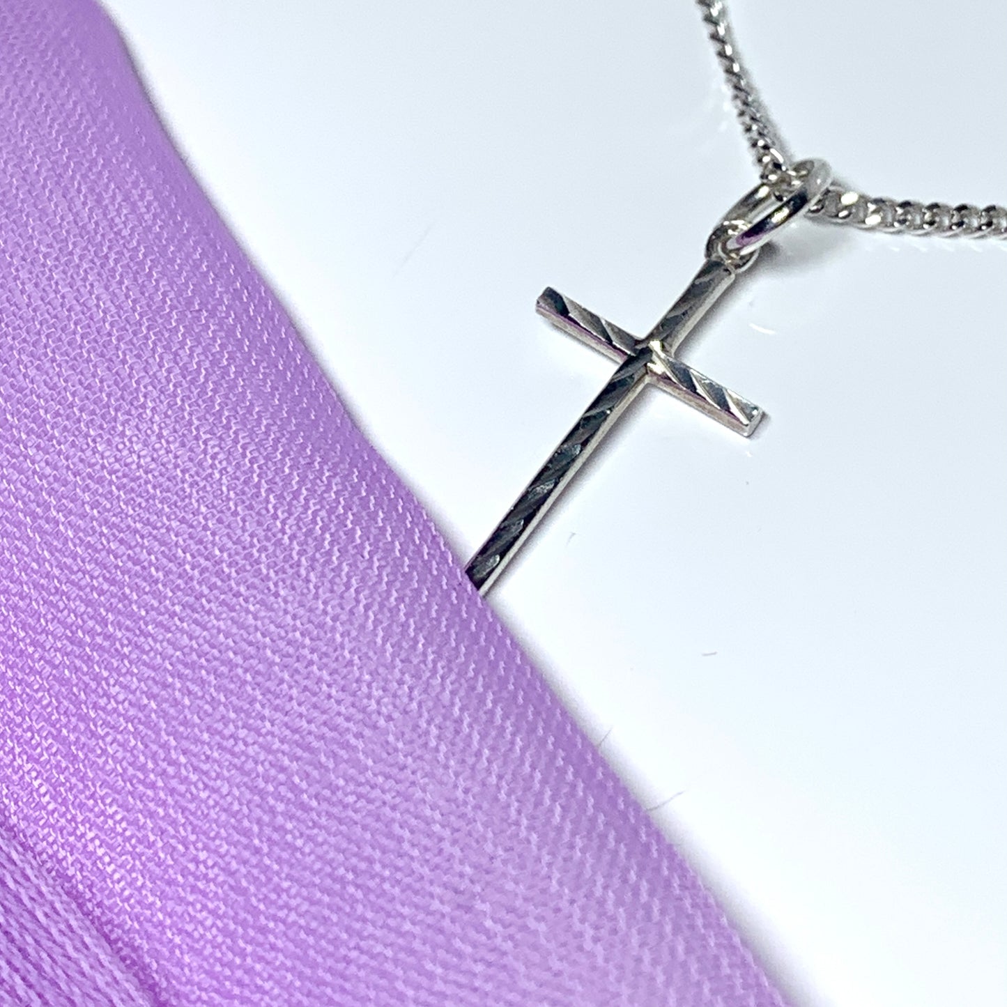 Small solid diamond cut reversible cross patterned sterling silver and chain