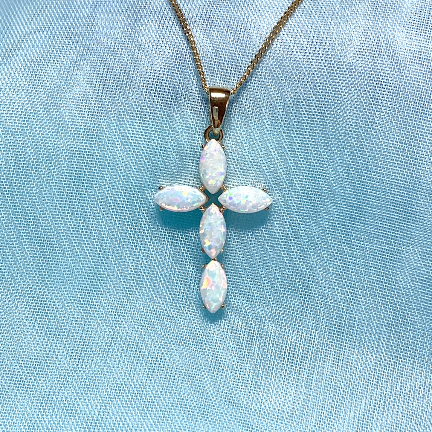 Small yellow gold opal cross necklace including chain