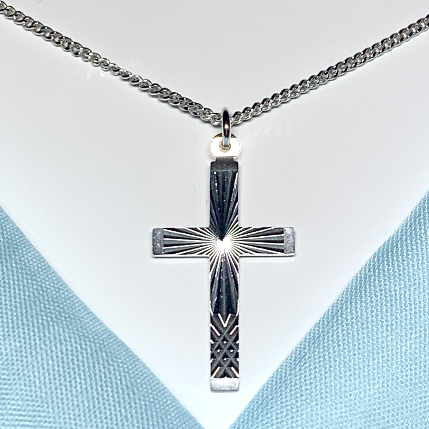 Solid cross patterned sterling silver diamond cut including chain