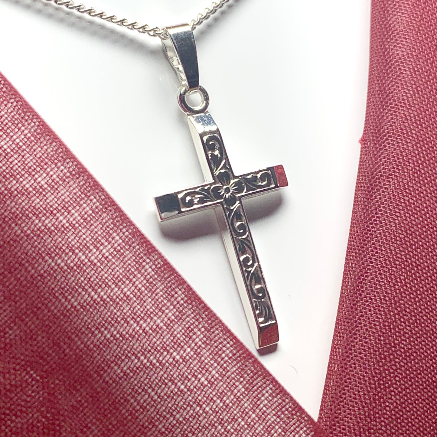 Solid diamond cut cross patterned sterling silver including chain