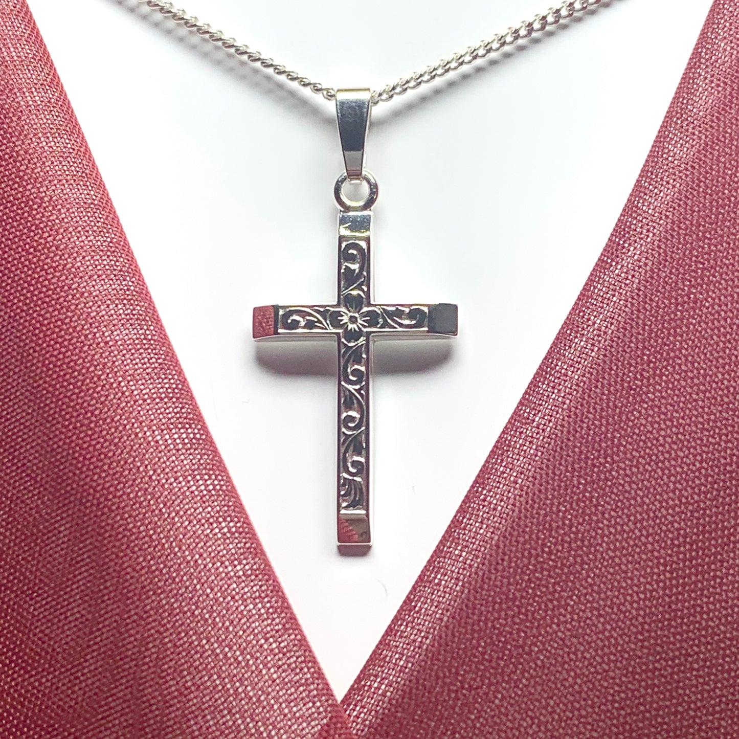 Solid diamond cut cross patterned sterling silver including chain