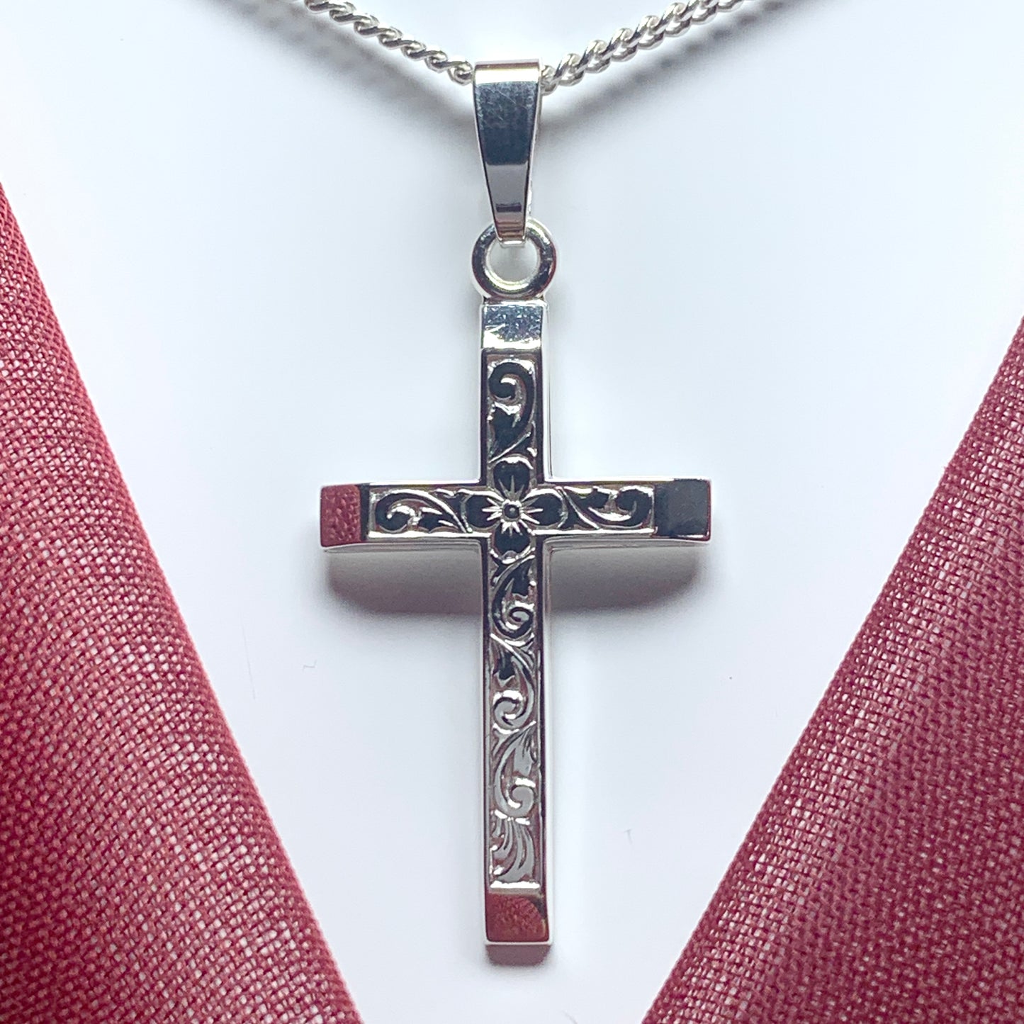 Solid diamond cut cross patterned sterling silver including chain