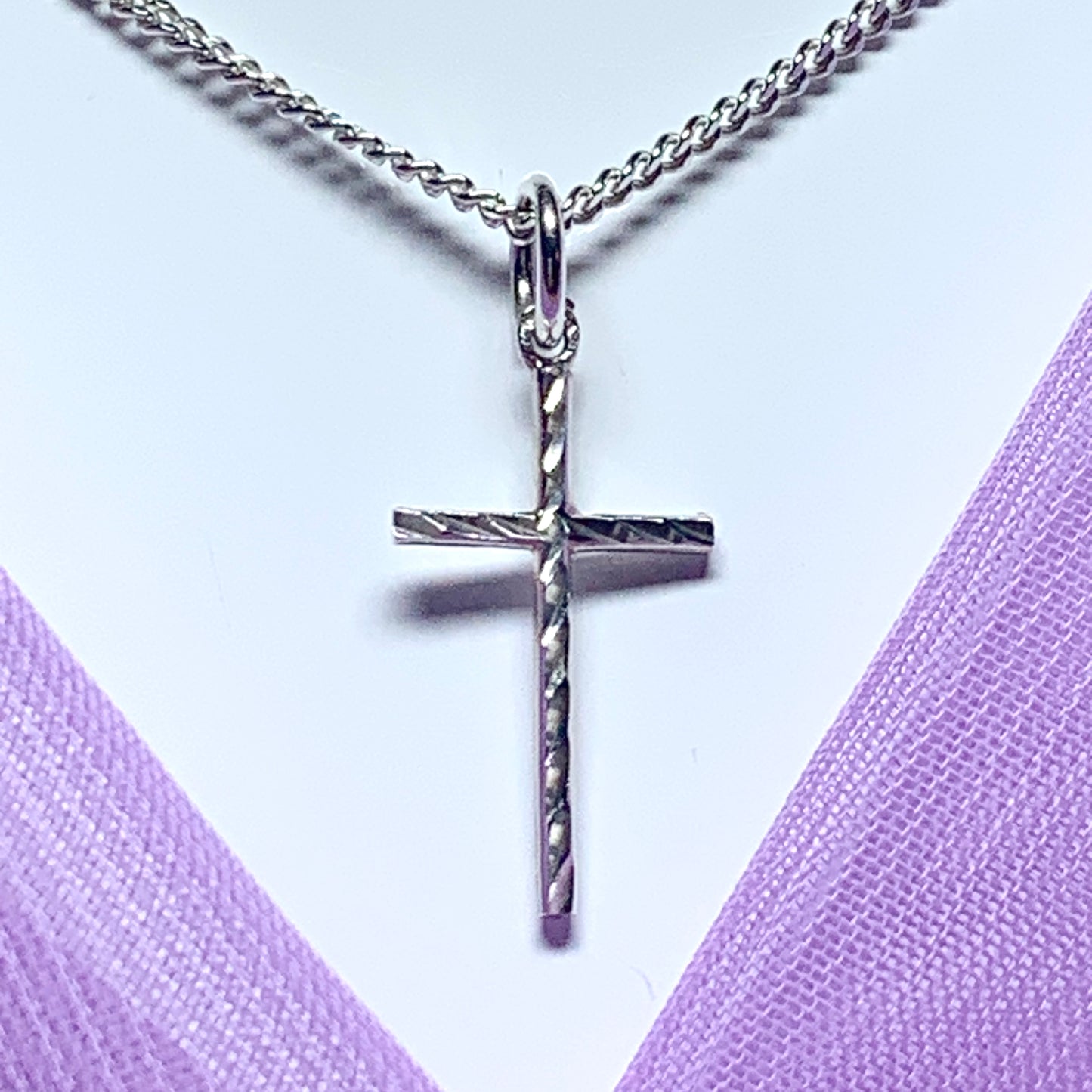 Small solid diamond cut reversible cross patterned sterling silver and chain