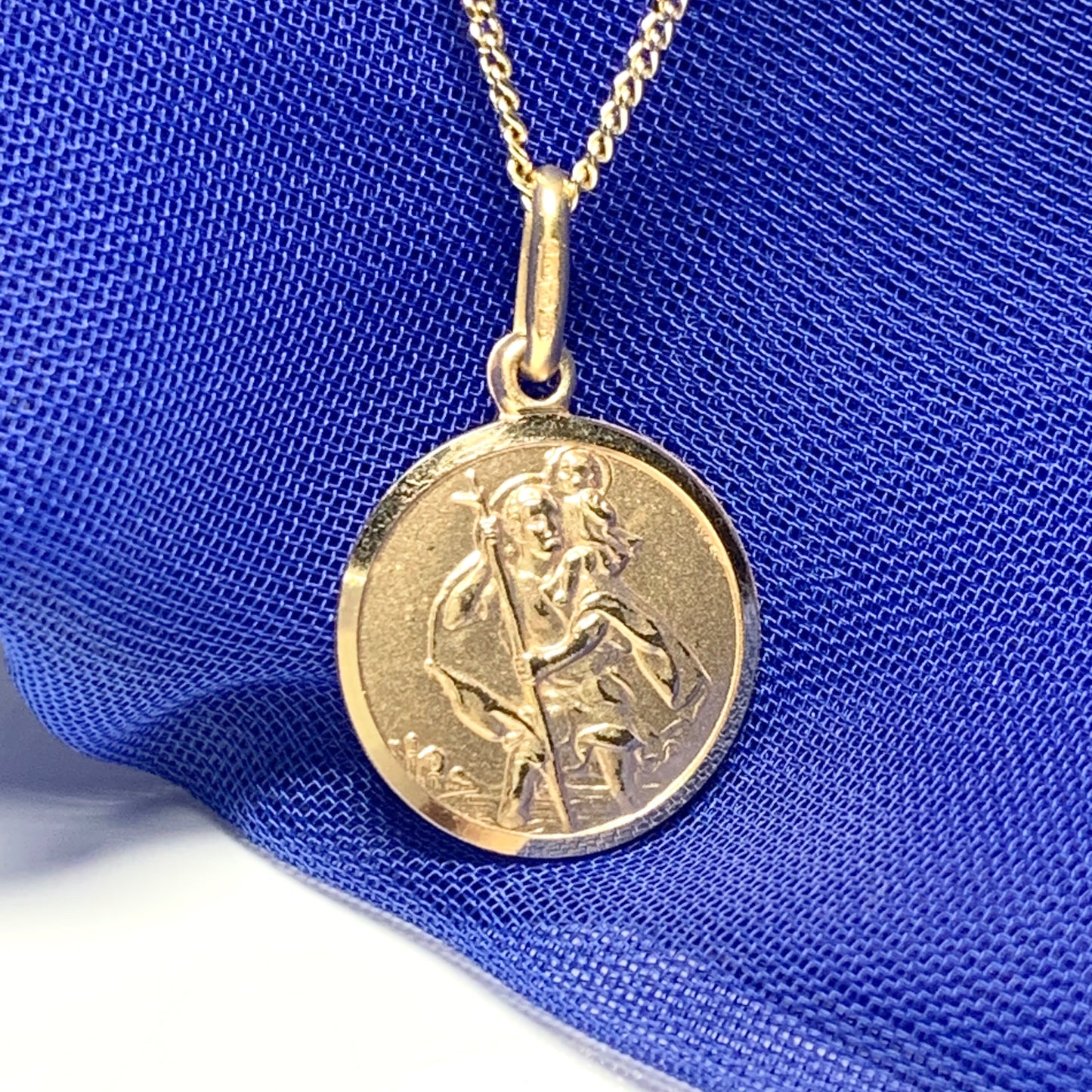 Solid round St. Christopher yellow gold