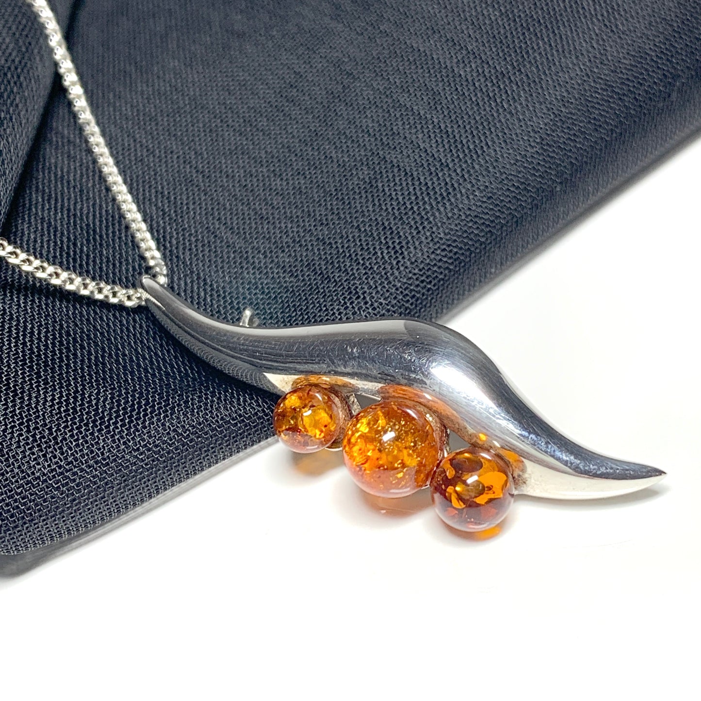 Sterling Silver Amber Swirl Necklace