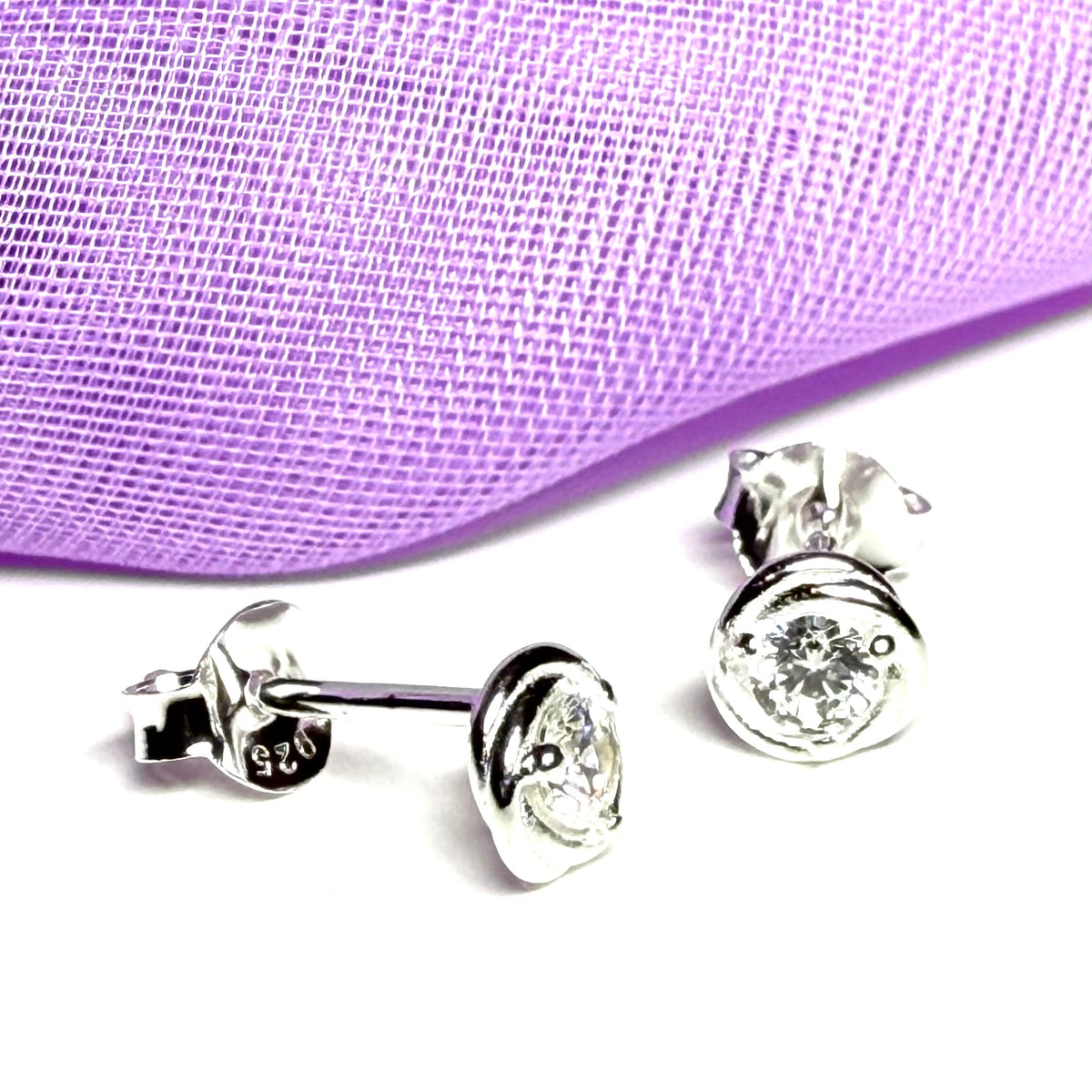 Sterling Silver Round Twisted Edge Cubic Zirconia Stud Earrings