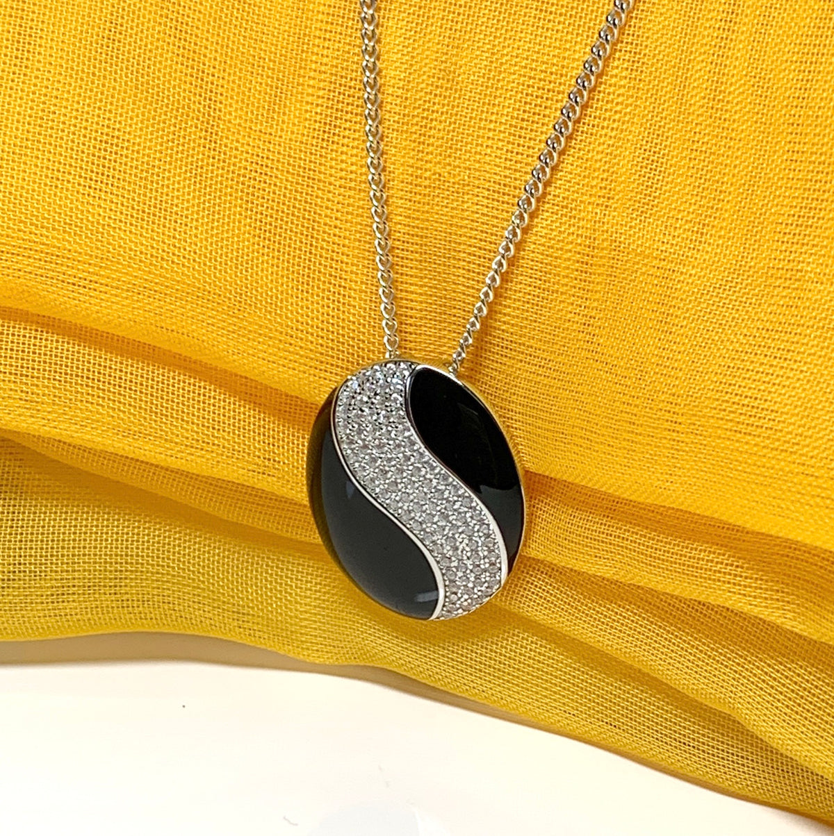 Sterling silver black real enamel oval shaped necklace pendant with cubic zirconia