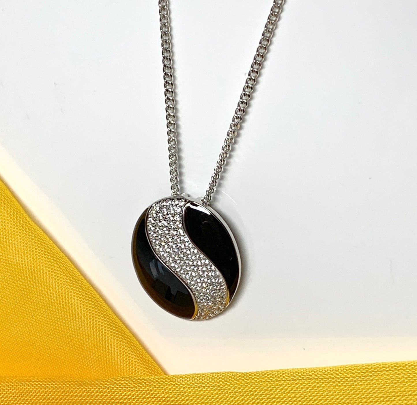 Sterling silver black real enamel oval shaped necklace pendant with cubic zirconia
