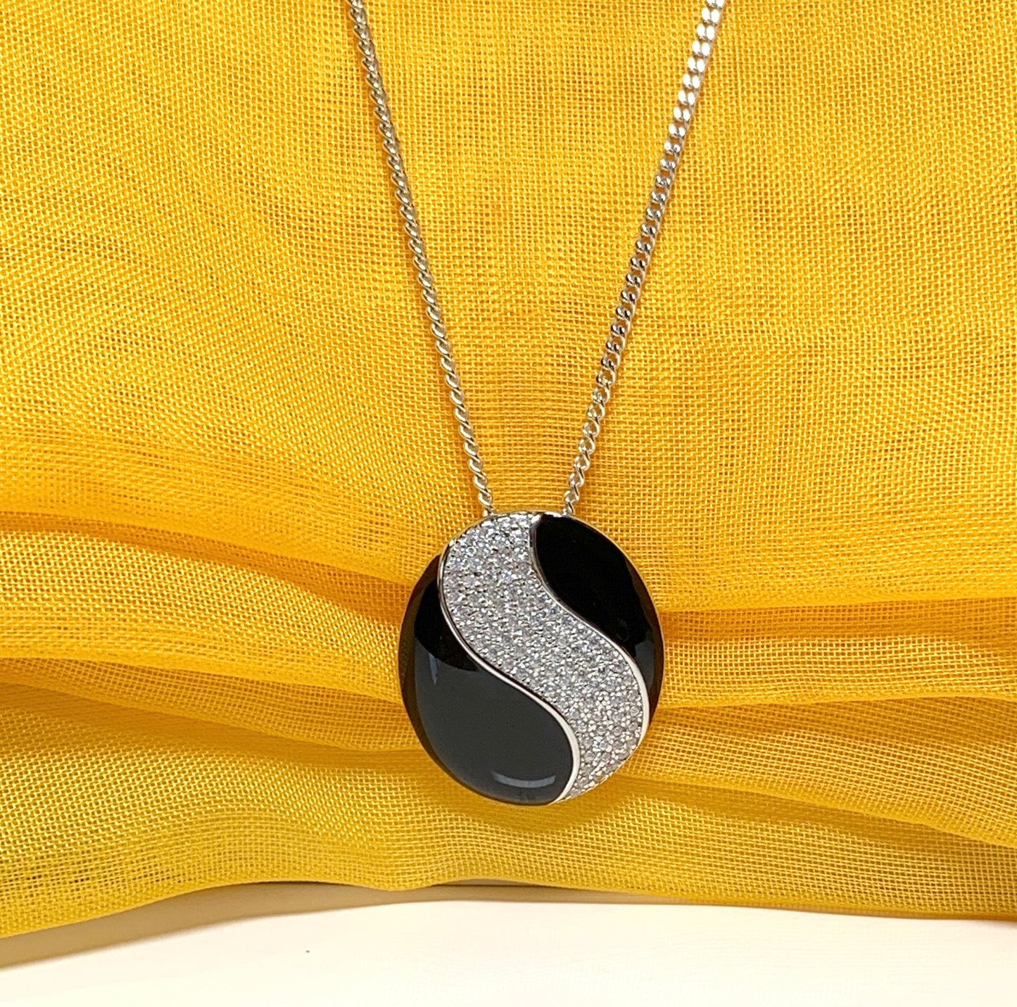 Sterling silver black real enamel oval shaped necklace pendant with cubic zirconia