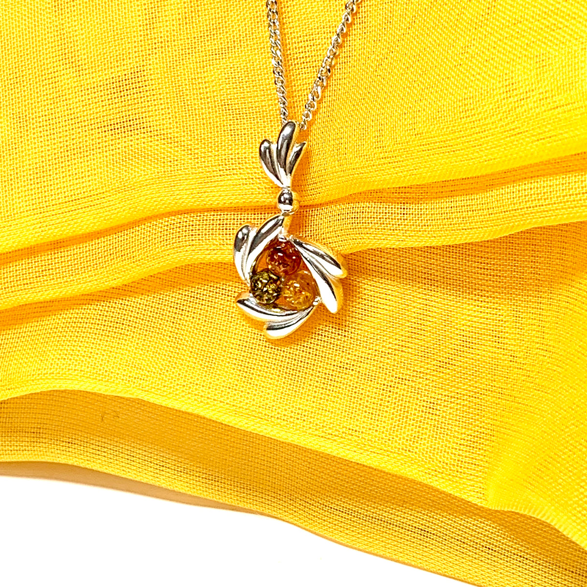 Swirl sterling silver multi coloured real amber necklace pendant
