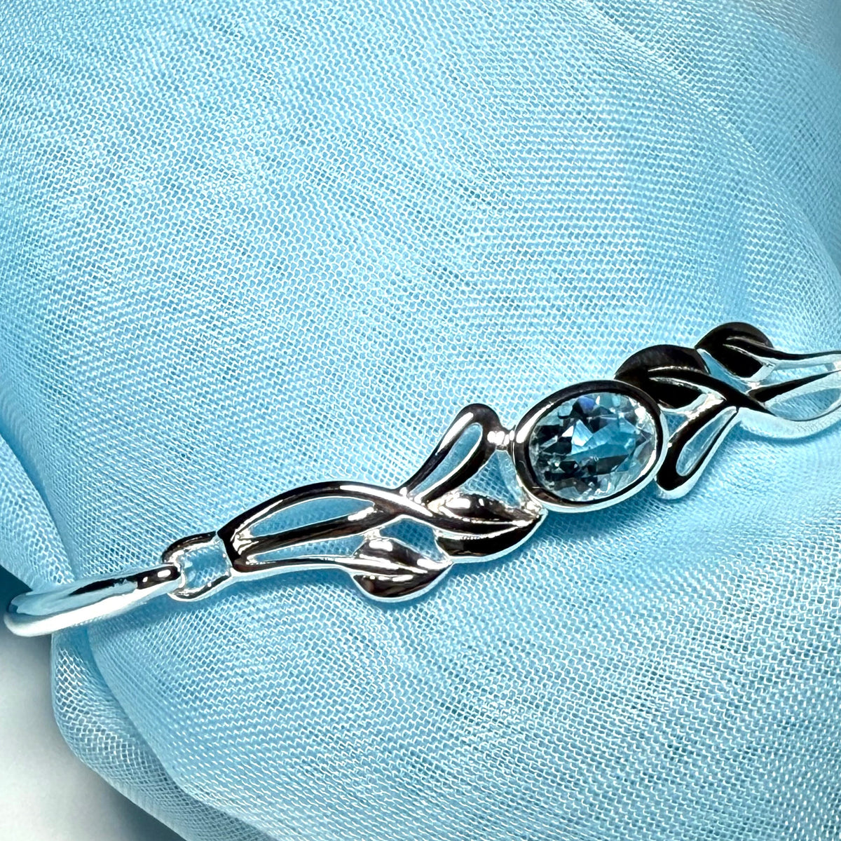 Sterling silver oval real blue topaz bangle