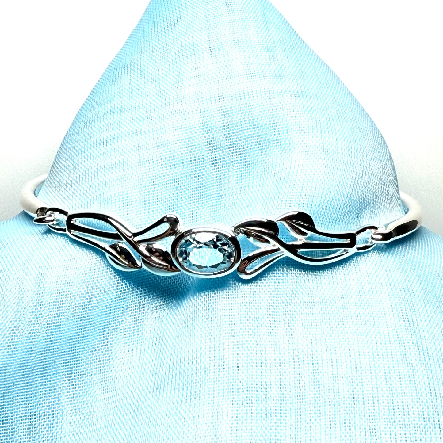 Sterling silver oval real blue topaz bangle