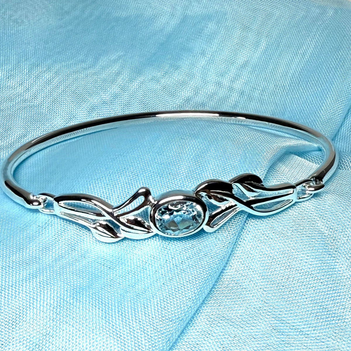 Sterling silver oval real blue topaz bangle